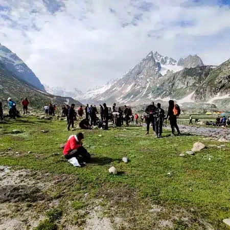 Trekkers reassemble near the Pangarchulla Peak Trek